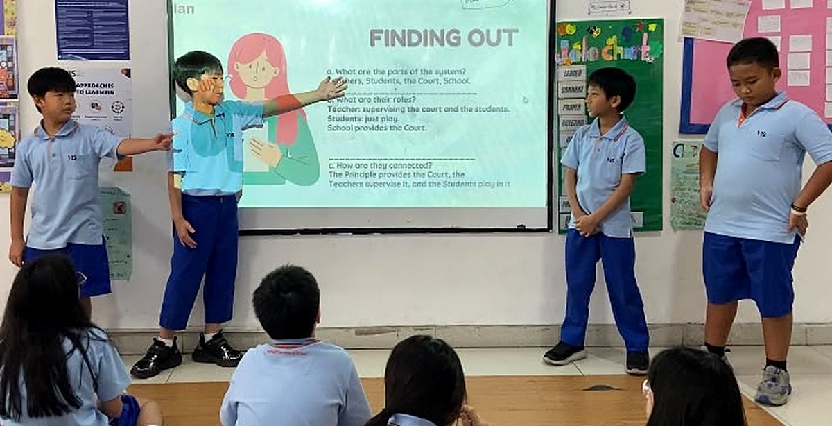Students sharing ideas and investigating together